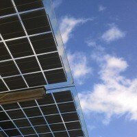 solar panels and a blue sky